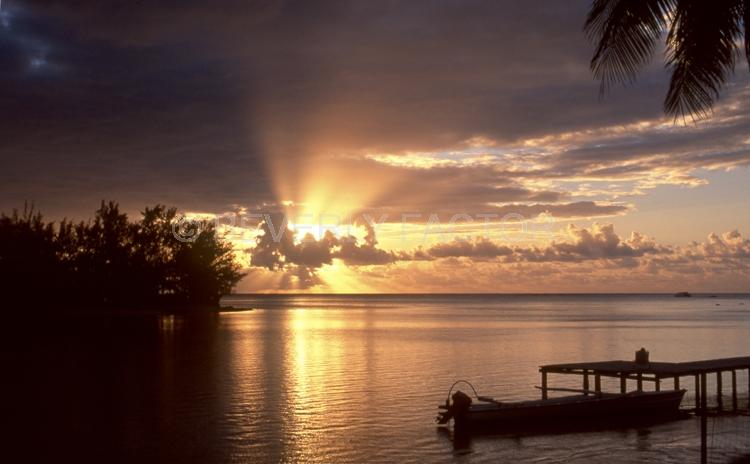 Sunset Island;colorful;yellow;sunset;sky;water;boat;pink;sillouettes;Moorea;french polynesia